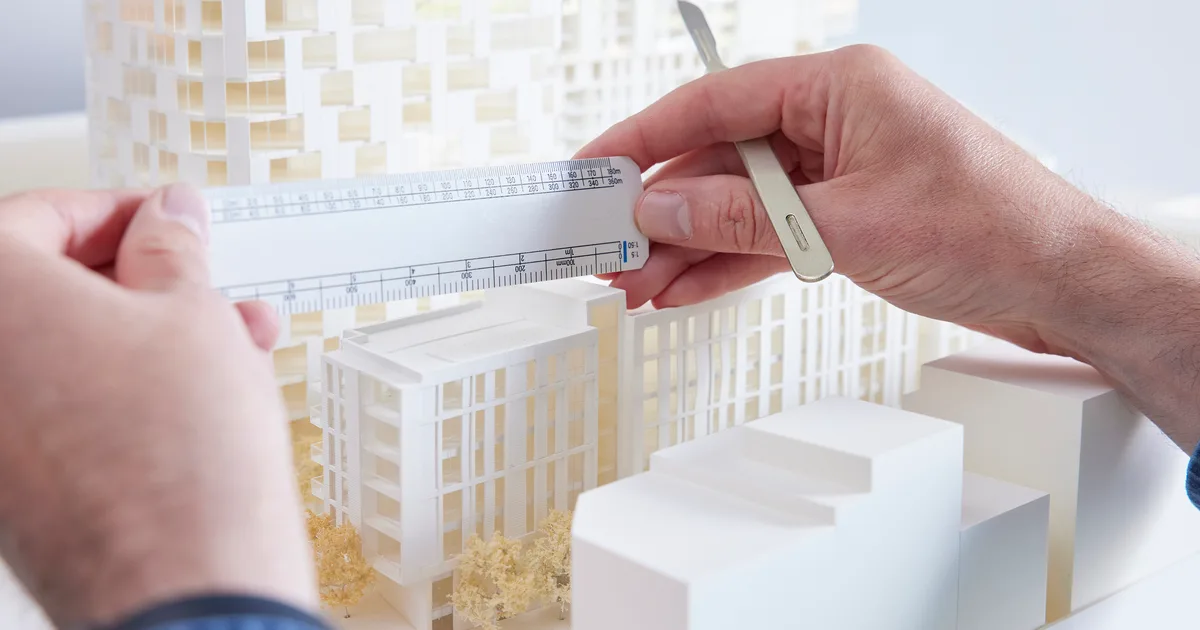 Architects reviewing drawings in a design studio